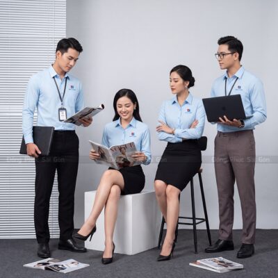 Áo sơ mi đồng phục công ty màu xanh in logo thương hiệu 1