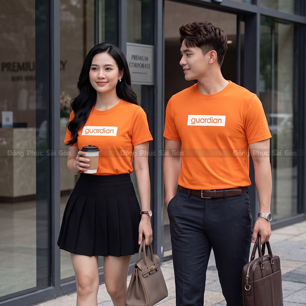 Áo thun cổ tròn may sẵn in logo theo 2êu cầu màu cam 3