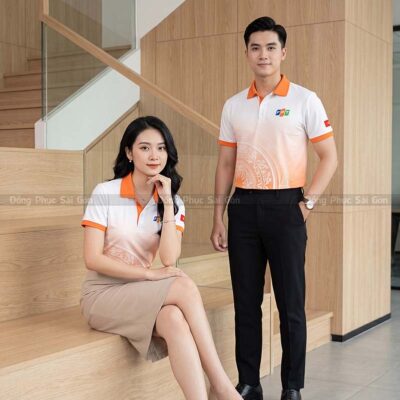 Mẫu áo đồng phục công ty màu trắng phối bo cổ cam đẹp 1